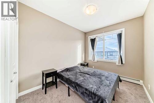 312, 48 Panatella Road Nw, Calgary, AB - Indoor Photo Showing Bedroom