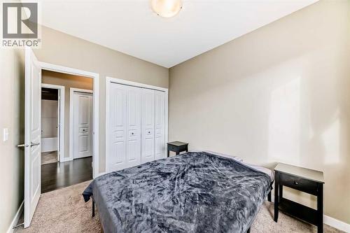 312, 48 Panatella Road Nw, Calgary, AB - Indoor Photo Showing Bedroom