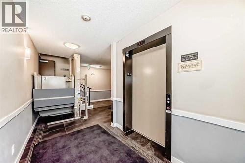 312, 48 Panatella Road Nw, Calgary, AB - Indoor Photo Showing Other Room