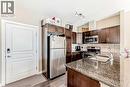 312, 48 Panatella Road Nw, Calgary, AB  - Indoor Photo Showing Kitchen With Double Sink 