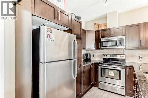 312, 48 Panatella Road Nw, Calgary, AB - Indoor Photo Showing Kitchen