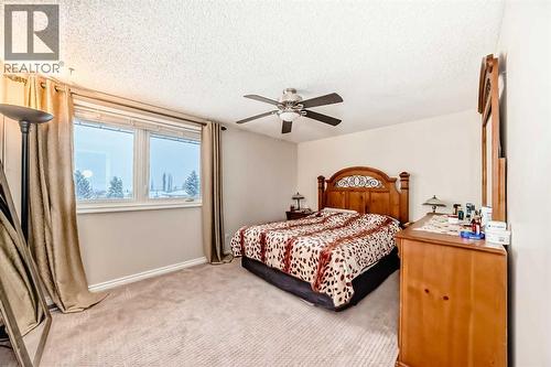 Primary bedroom - 562 Strathcona Drive Sw, Calgary, AB - Indoor Photo Showing Bedroom
