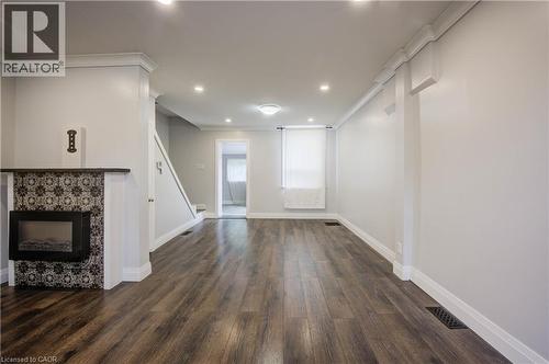 303 Hunter Street W, Hamilton, ON - Indoor Photo Showing Other Room With Fireplace