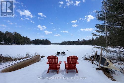 Winter at the Dock - 1170 English Circle, Highlands East (Glamorgan), ON - Outdoor With Body Of Water With View