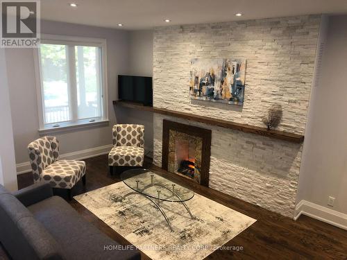 511 Indian Grove, Toronto, ON - Indoor With Fireplace