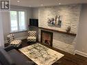511 Indian Grove, Toronto, ON  - Indoor With Fireplace 