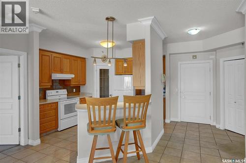 403 3101 Renfrew Crescent E, Regina, SK - Indoor Photo Showing Kitchen
