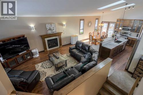 380 Grizzly Crescent N, Lethbridge, AB - Indoor Photo Showing Living Room With Fireplace