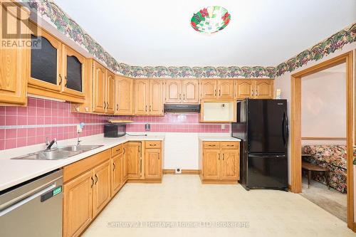 Spacious Eat in Kitchen - 20 - 2720 Mewburn Road, Niagara Falls (Casey), ON - Indoor Photo Showing Kitchen With Double Sink