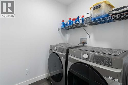 158 Ambleton Drive Nw, Calgary, AB - Indoor Photo Showing Laundry Room