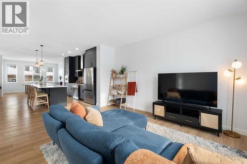 158 Ambleton Drive Nw, Calgary, AB - Indoor Photo Showing Living Room