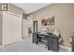 Third bedroom on the main floor, currently used as an office - 