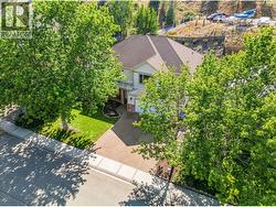 Exterior landscaping has been digitally enhanced to reflect summer conditions. Photos were taken during the winter season. - 