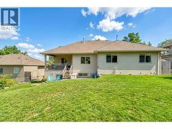 Backyard. Exterior landscaping has been digitally enhanced to reflect summer conditions. Photos were taken during the winter season. Original photos available upon request. - 