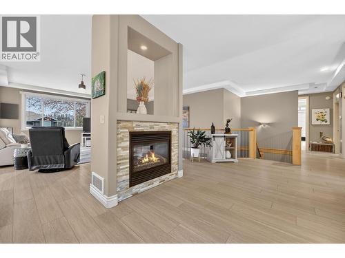 Main floor - 867 Steele Road, Kelowna, BC - Indoor Photo Showing Other Room With Fireplace