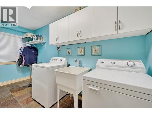 Downstairs laundry room - 867 Steele Road, Kelowna, BC - Indoor Photo Showing Laundry Room