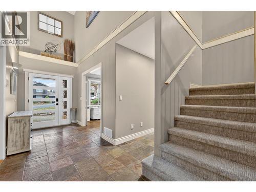 Foyer and stairs to main floor - 867 Steele Road, Kelowna, BC - Indoor Photo Showing Other Room