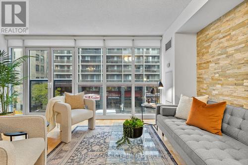Floor to ceiling glass - 328 - 25 Carlton Street, Toronto, ON - Indoor Photo Showing Living Room