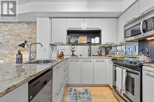 Beautiful kitchen with stainless appliances! - 328 - 25 Carlton Street, Toronto, ON - Indoor Photo Showing Kitchen With Upgraded Kitchen