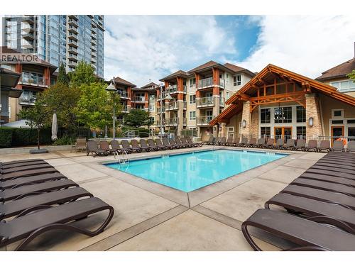 1099 Sunset Drive Unit# 123, Kelowna, BC - Outdoor With In Ground Pool With Facade