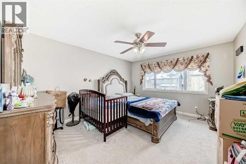 2468 Kingsland View Se, Airdrie, AB - Indoor Photo Showing Bedroom