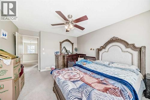 2468 Kingsland View Se, Airdrie, AB - Indoor Photo Showing Bedroom