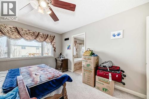 2468 Kingsland View Se, Airdrie, AB - Indoor Photo Showing Bedroom