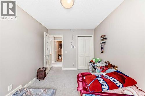 2468 Kingsland View Se, Airdrie, AB - Indoor Photo Showing Bedroom