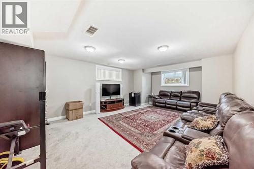 2468 Kingsland View Se, Airdrie, AB - Indoor Photo Showing Living Room