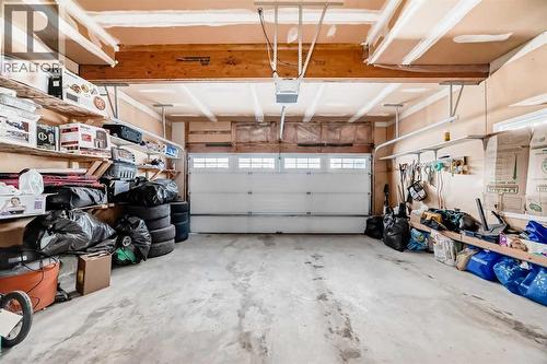 2468 Kingsland View Se, Airdrie, AB - Indoor Photo Showing Garage