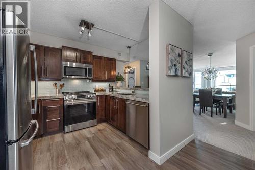 1109, 804 3 Avenue Sw, Calgary, AB - Indoor Photo Showing Kitchen With Stainless Steel Kitchen