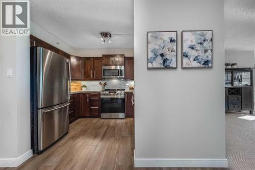 1109, 804 3 Avenue Sw, Calgary, AB - Indoor Photo Showing Kitchen With Stainless Steel Kitchen