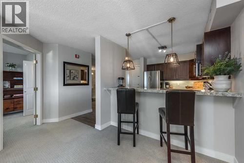 1109, 804 3 Avenue Sw, Calgary, AB - Indoor Photo Showing Kitchen With Upgraded Kitchen