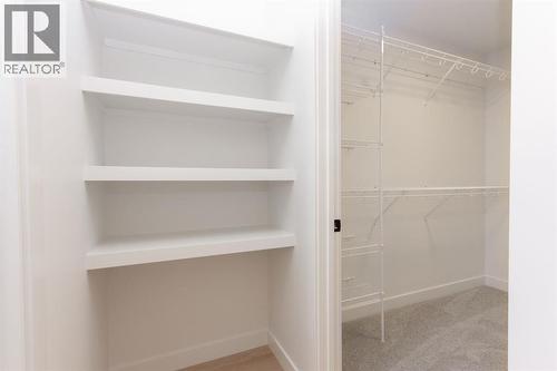 12 Trinity Street, Lacombe, AB - Indoor With Storage