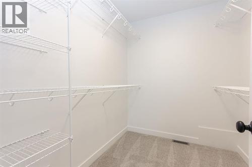 12 Trinity Street, Lacombe, AB - Indoor With Storage