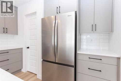 12 Trinity Street, Lacombe, AB - Indoor Photo Showing Kitchen With Stainless Steel Kitchen
