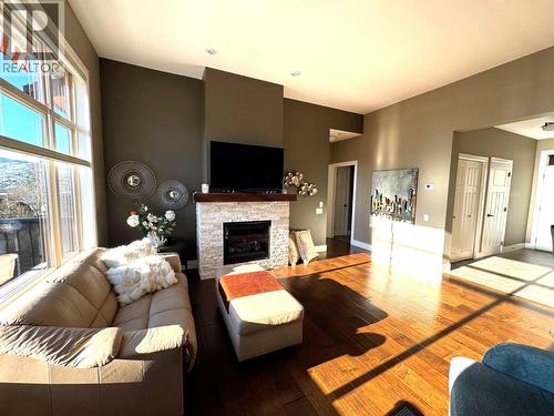 2167 Talavera Place, Westbank, BC - Indoor Photo Showing Living Room With Fireplace