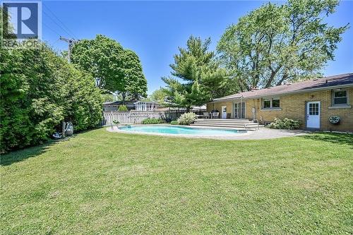128 Oneida Boulevard, Ancaster, ON - Outdoor With In Ground Pool