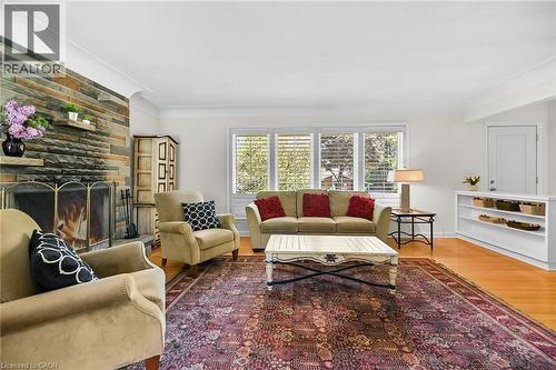 128 Oneida Boulevard, Ancaster, ON - Indoor Photo Showing Living Room With Fireplace