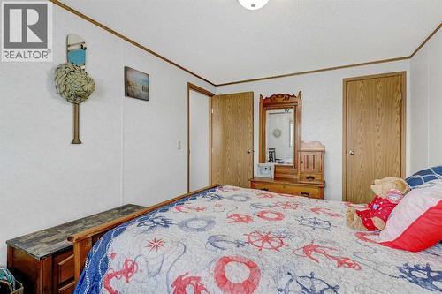 10914 96 Street, Clairmont, AB - Indoor Photo Showing Bedroom
