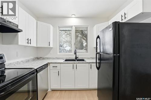 1910 Ewart Avenue, Saskatoon, SK - Indoor Photo Showing Kitchen With Double Sink