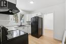 1910 Ewart Avenue, Saskatoon, SK  - Indoor Photo Showing Kitchen With Double Sink 