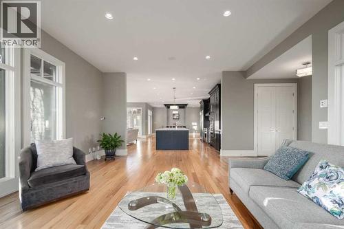 16 Spring Valley Way Sw, Calgary, AB - Indoor Photo Showing Living Room