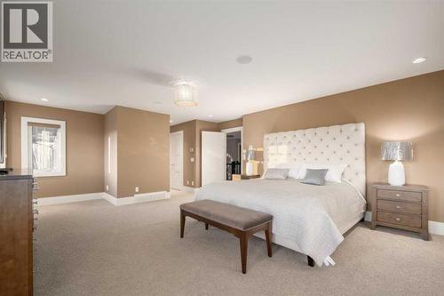 16 Spring Valley Way Sw, Calgary, AB - Indoor Photo Showing Bedroom