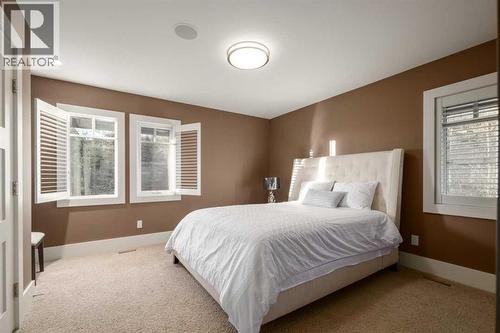 16 Spring Valley Way Sw, Calgary, AB - Indoor Photo Showing Bedroom