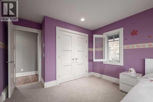 16 Spring Valley Way Sw, Calgary, AB - Indoor Photo Showing Bedroom