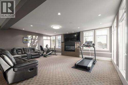 16 Spring Valley Way Sw, Calgary, AB - Indoor With Fireplace