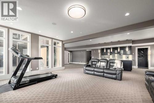 16 Spring Valley Way Sw, Calgary, AB - Indoor Photo Showing Gym Room