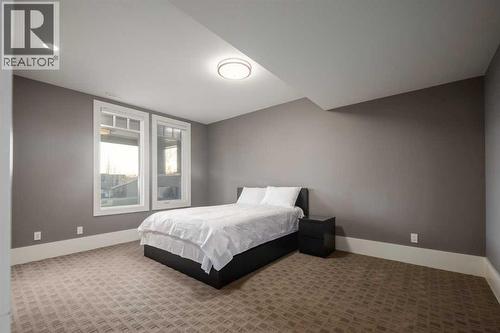 16 Spring Valley Way Sw, Calgary, AB - Indoor Photo Showing Bedroom
