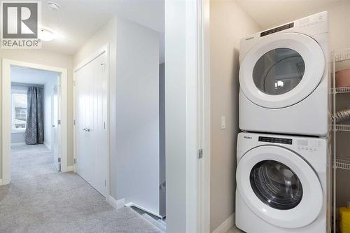 46 Evanston Hill Nw, Calgary, AB - Indoor Photo Showing Laundry Room